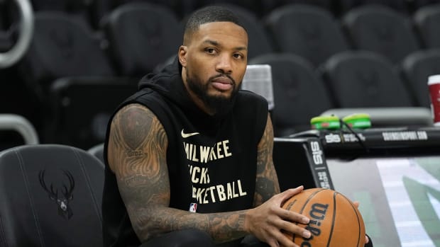 Milwaukee Bucks guard Damian Lillard (0) looks on during warmups 